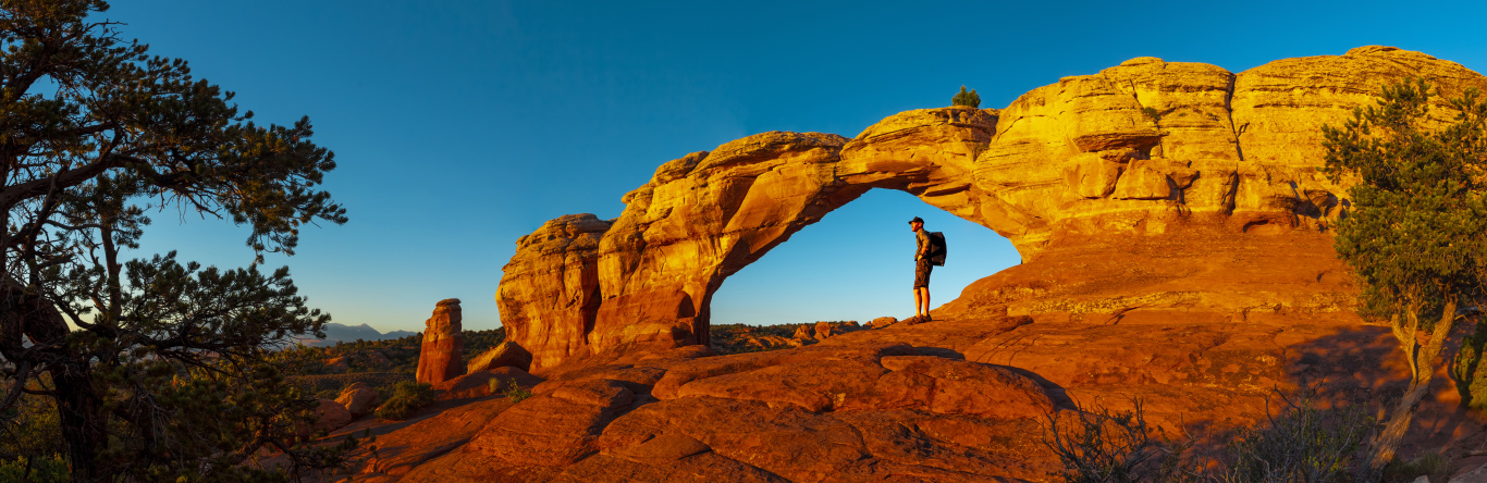 Hiker resting in Turret Arch